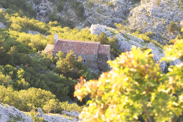 Elevated view of the old church of Santa Maria in Siaris, Rosandra Valley, Trieste province, Friuli Venezia Giulia, Italy.