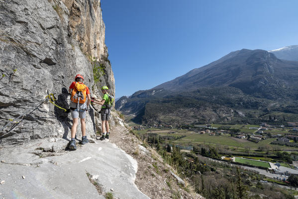 Arco, Trento province, Trentino, Italy. Climber on the via ferrata Colodri