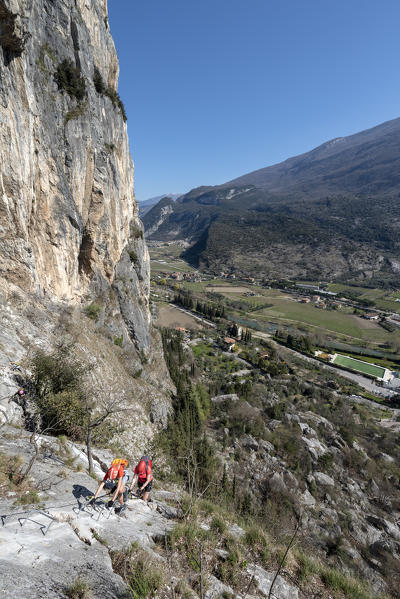 Arco, Trento province, Trentino, Italy. Climber on the via ferrata Colodri