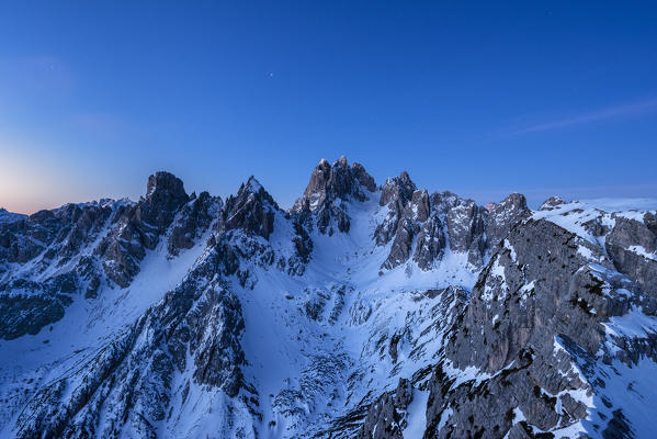 Mount Campedelle, Misurina, Auronzo di Cadore, province of Belluno, Veneto, Italy, Europe. Blue hour over the Cadini mountains