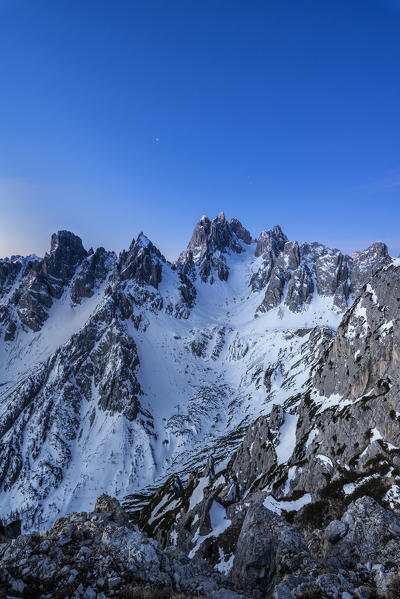 Mount Campedelle, Misurina, Auronzo di Cadore, province of Belluno, Veneto, Italy, Europe. Blue hour over the Cadini mountains