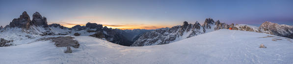 Mount Campedelle, Misurina, Auronzo di Cadore, province of Belluno, Veneto, Italy, Europe. Sunrise over the Ansiei valley with the village of Auronzo, above the Tre Cime di Lavaredo, Croda dei Toni and Cadini di Misurina mountains