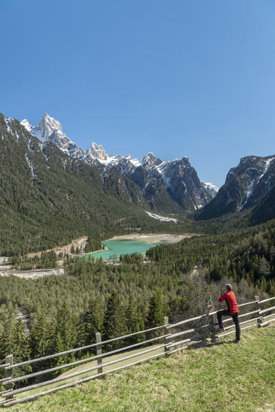 Dobbiaco/Toblach, Dolomites, South Tyrol, Italy. The lake Dobbiaco with the peaks of Croda dei Baranci and Croda Bagnata.