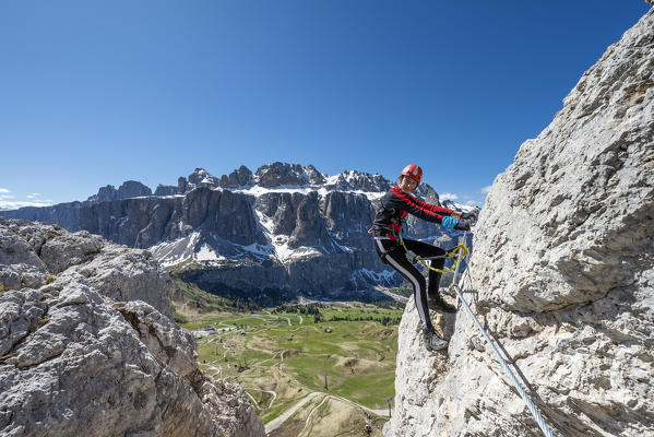 Cir, Dolomites, South Tyrol, Italy. Climber on the via ferrata of Cir V (MR)