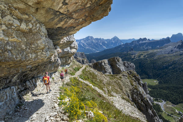 Falzarego Pass, Dolomites, province of Belluno, Veneto, Italy. Mountaineers on the path to the Lagazuoi war tunnel (MR)