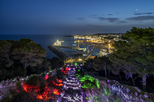 Castrignano del Capo, Santa Maria di Leuca, Salento, Apulia, Italy. The illuminated monumental waterfall of Santa Maria di Leuca