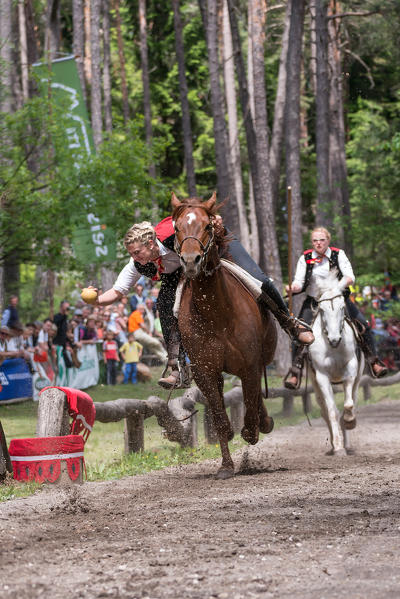 Fie, South Tyrol, Italy. The third tournament at Lake Fiè is the gallop. The wooden ball must be put into the basket