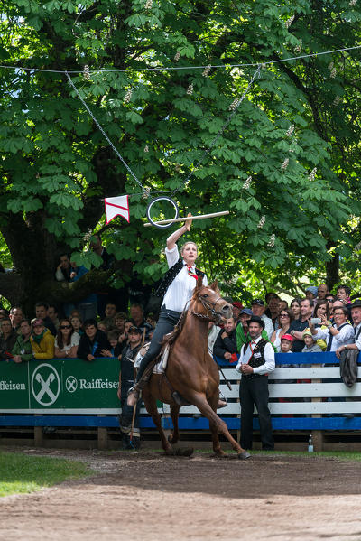 Castelrotto, South Tyrol, Italy. The traditional ring jousting at the Monte Calvario