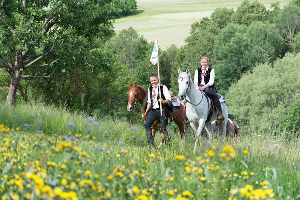 Castelrotto, South Tyrol, Italy. Participants of the Oswald of Wolkenstein Ride on the climb to Castelrotto