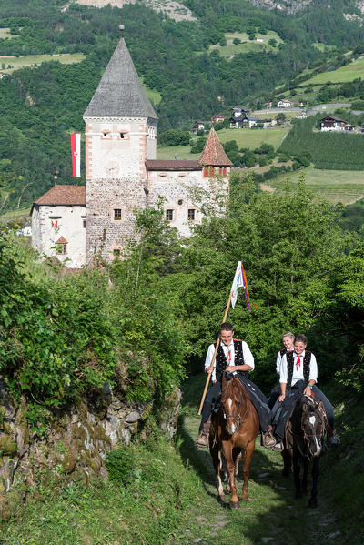 Castel Forte, South Tyrol, Italy. The team Koenigswarte of Castelrotto infront of Castel Forte