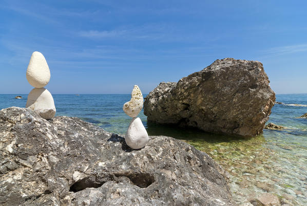 Conero, Marche, Italy. On the beach of Sassi Neri (black stones)