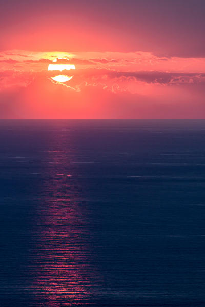 Zambrone, Vibo Valentia, Calabria, Italy. Glowing sunset over the Tyrrhenian sea