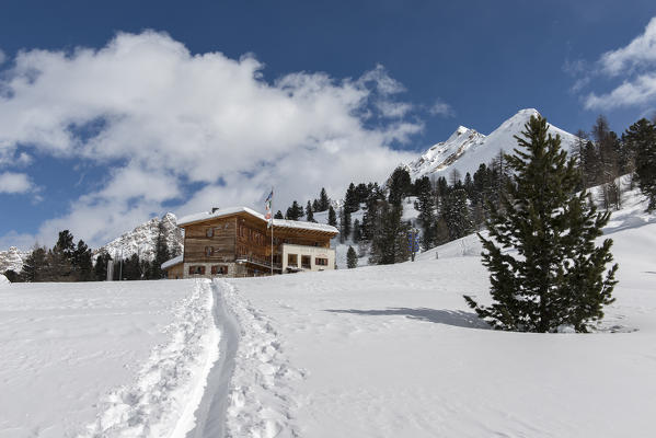 Fanes, Dolomites, South Tyrol, Italy. The refuge Fanes with the Col Becchei in the background