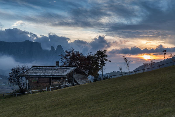 Alpe di Siusi/Seiser Alm, Dolomites, South Tyrol, Italy. Sunset on the Alpe di Siusi/Seiser Alm with the Sciliar/Schlern