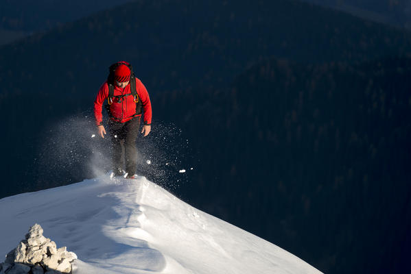 Picco di Vallandro, Prato Piazza, Dolomites, South Tyrol, Italy. Mountaineer on the ridge to the Picco di Vallandro