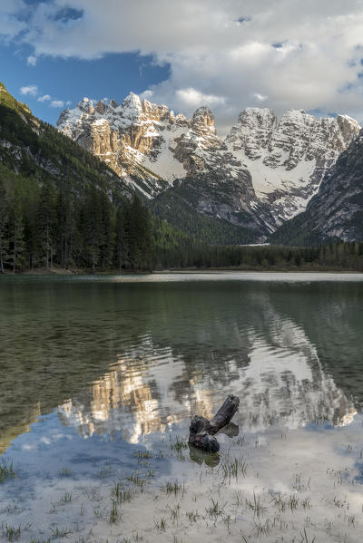 Carbonin, Dolomites, South Tyrol, Italy. Lake Landro with the peaks of the Cistallo group at sunset