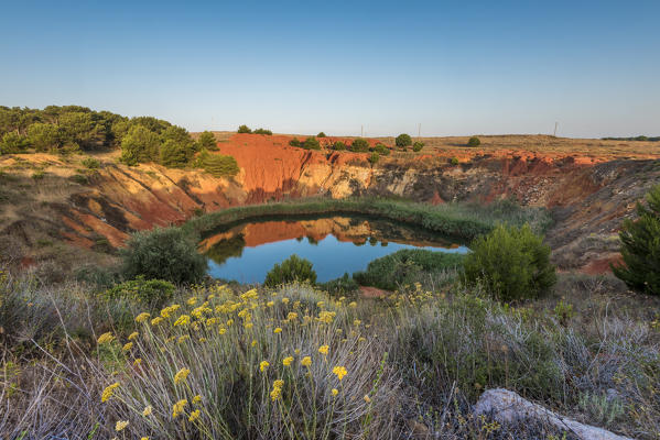 Otranto, province of Lecce, Salento, Apulia, Italy. Abandonet Bauxite Mine with green Lake