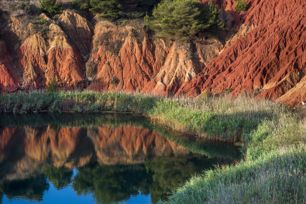 Otranto, province of Lecce, Salento, Apulia, Italy. Abandonet Bauxite Mine with green Lake