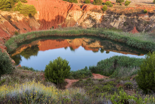 Otranto, province of Lecce, Salento, Apulia, Italy. Abandonet Bauxite Mine with green Lake