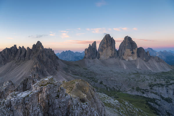 Sesto/Sexten, Dolomites, South Tyrol, Italy. Dawne over the Tre Cime di Lavaredo/Drei Zinnen. Taken from the summit of Torre di Toblin/Toblinger Knoten