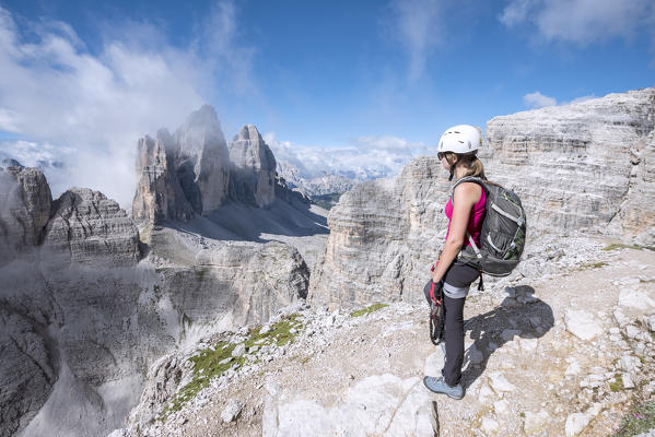 Sesto/Sexten, Dolomites, South Tyrol, province of Bolzano, Italy. Climber on the via ferrata 