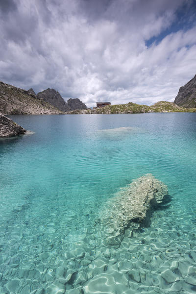 Lienz Dolomites, East Tyrol, Austria. The Karlsbader hut and the Lake Laserz