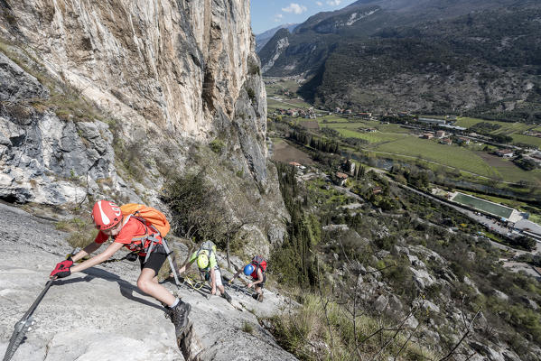 Arco, Trento province, Trentino, Italy. Climber on the via ferrata Colodri