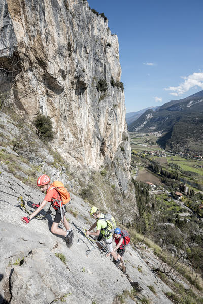 Arco, Trento province, Trentino, Italy. Climber on the via ferrata Colodri