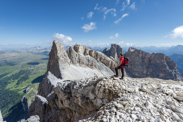 Cima dei Bureloni, Paneveggio-Pale of San Martino natural park, Trento province, Trentino Alto Adige, Italy, Europe. A mountaineer on the way to the summit of Cima dei Bureloni