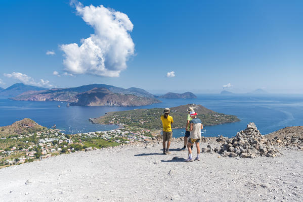 Volcano, Messina district, Sicily, Italy, Europe. Hikers on the crater of Vulcano