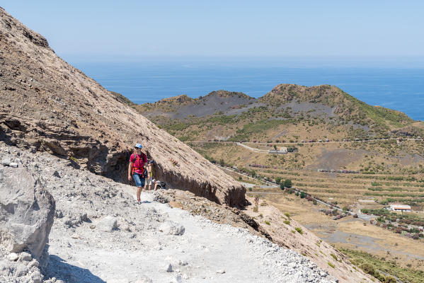 Volcano, Messina district, Sicily, Italy, Europe. Hiker in the ascent to the crater of the Vulcano