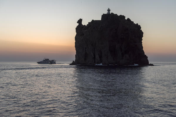 Stromboli, Messina district, Sicily, Italy, Europe. The Strombolicchio at Sunset