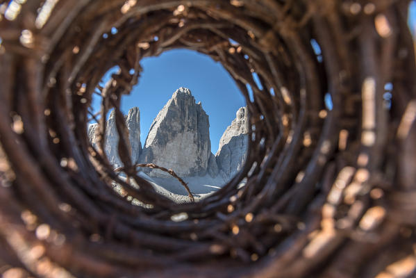 Sesto / Sexten, province of Bolzano, Dolomites, South Tyrol, Italy. Barbed wire from the First World War in front of the Three Peaks of Lavaredo