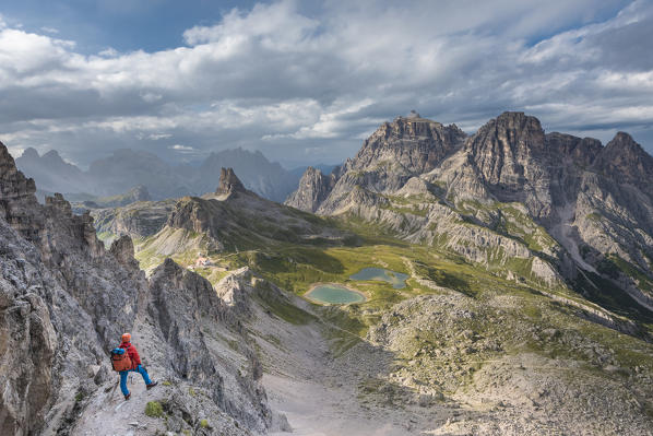 Sesto / Sexten, province of Bolzano, Dolomites, South Tyrol, Italy. Climber on the via ferrata 