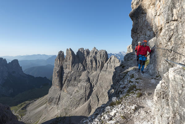 Sesto / Sexten, province of Bolzano, Dolomites, South Tyrol, Italy. Climbers on the via ferrata 