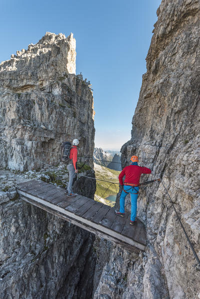 Sesto / Sexten, province of Bolzano, Dolomites, South Tyrol, Italy. Climber on the via ferrata 