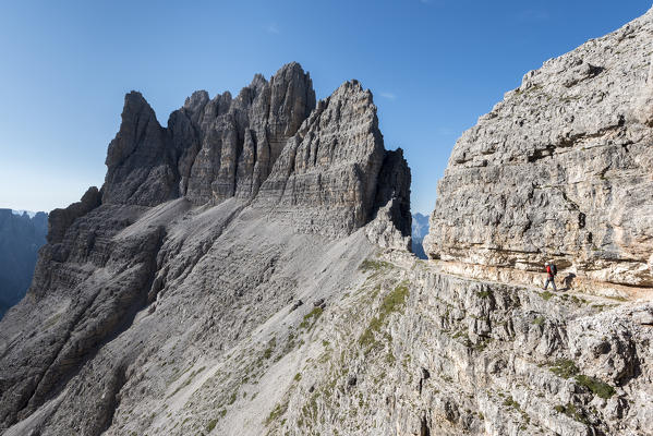 Sesto / Sexten, province of Bolzano, Dolomites, South Tyrol, Italy. Climber on the via ferrata 