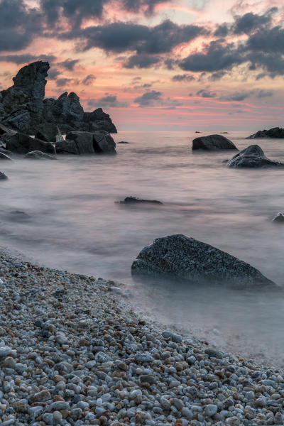 Zambrone, province of Vibo Valentia, Calabria, Italy, Europe. Sunset on the beach of Lion's rock