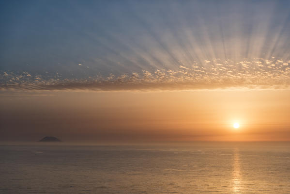 Zambrone, province of Vibo Valentia, Calabria, Italy, Europe. Sunset in Zambrone with a view of the Stromboli volcano