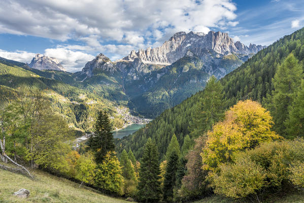 Bramezza, Rocca Pietore, provinze of Belluno, Veneto, Italy, Europe. View from Bramezza to the village Alleghe with its lake. Behind it the Mount Pelmo and Mount Civetta