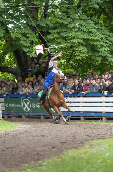 Castelrotto / Kastelruth, South Tyrol, Italy. The traditional ring jousting at the Mount Calvario in Castelrotto 