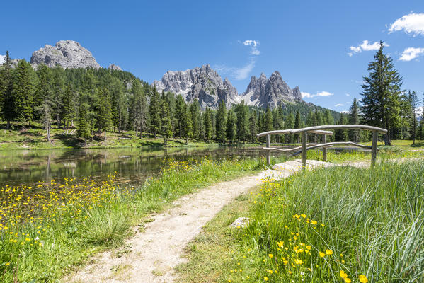 Misurina, Dolomites, province of Belluno, Veneto, Italy. The lake Antorno with Cadini in the background