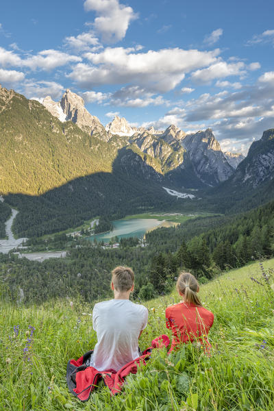 Dobbiaco/Toblach, Dolomites, South Tyrol, Italy. Children admire the Dobbiaco Lake (MR)