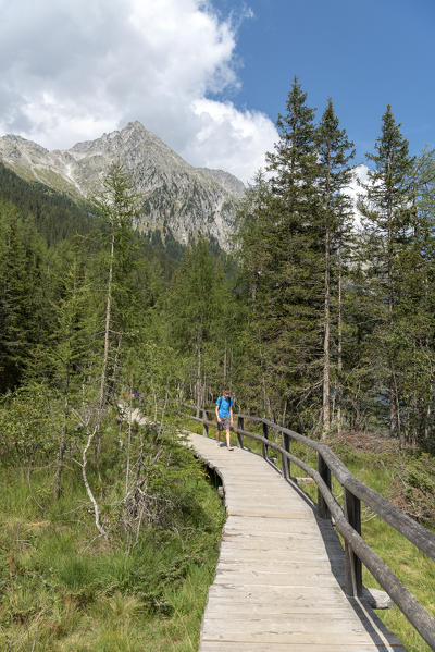 Anterselva / Antholz, province of Bolzano, South Tyrol, Italy. Hiking on the nature trail near the lake Anterselva