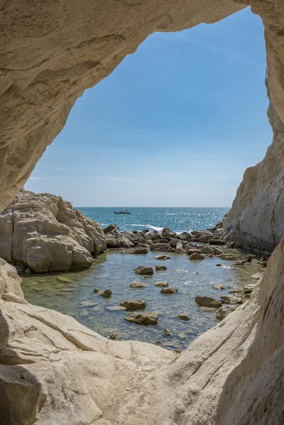 Sirolo, province of Ancona, Marche, Italy, Europe. The big rock grotto at the beach of Urbani