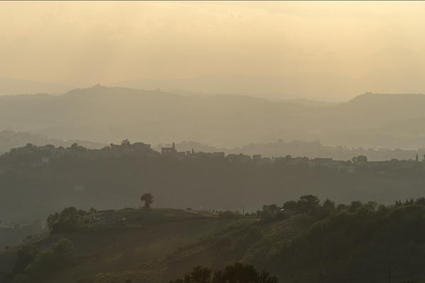 Montotto, Monterubbiano, province of Fermo, Marche, Italy, Europe. Hazy sunset in the hills around the village of Petritoli