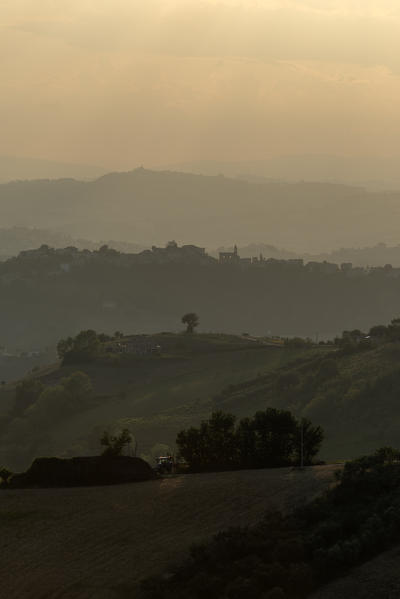 Montotto, Monterubbiano, province of Fermo, Marche, Italy, Europe. Hazy sunset in the hills around the village of Petritoli