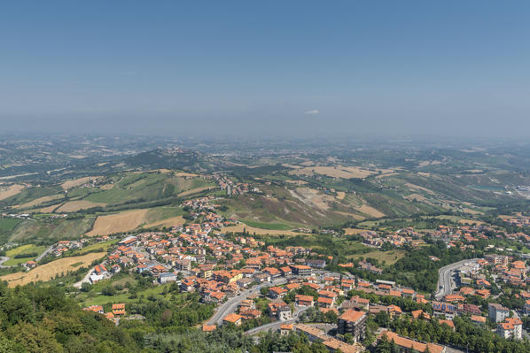 City of San Marino. Republic of San Marino, Europe. Panoramic view from the Mount Titano with the minor municipalities of Castello di Borgo Maggiore and castello di Domagnano