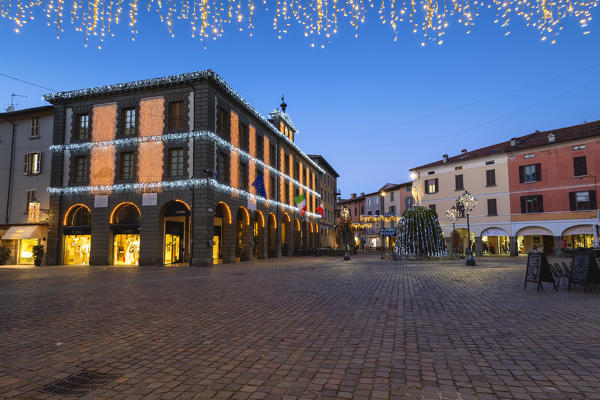 The blue hour in the central square of Iseo, Brescia province, Lombardy district, Italy.