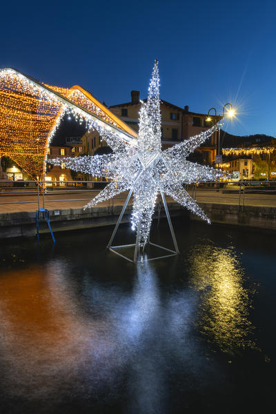 The blue hour in the Christmas village of Iseo, Brescia province, Lombardy district, Italy.